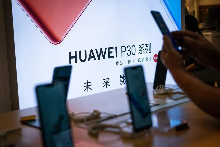 A number of countries have also blocked Huawei from working on their mobile networks and companies have stepped back from the firm following the US ban, citing legal requirements. (File/AFP)