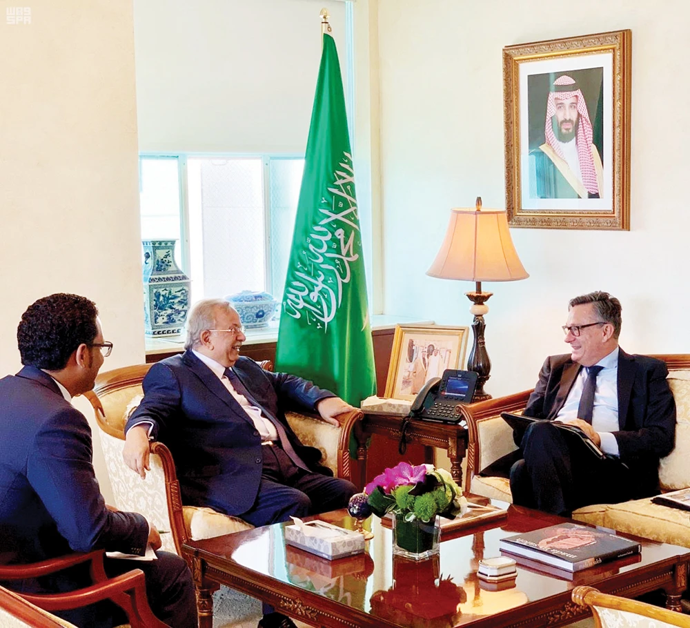 Saudi Ambassador to the UN Abdallah Yahya Al-Mouallimi meets Oliver Adam, executive coordinator of the UN Volunteers (UNV) program. (SPA)