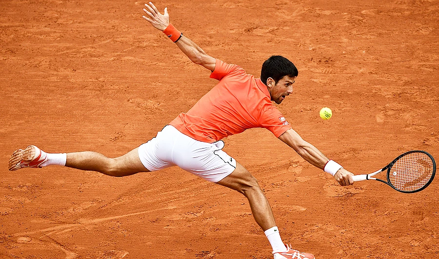 Djokovic became the first man to reach the French Open quarterfinals for 10 successive seasons. (AFP)