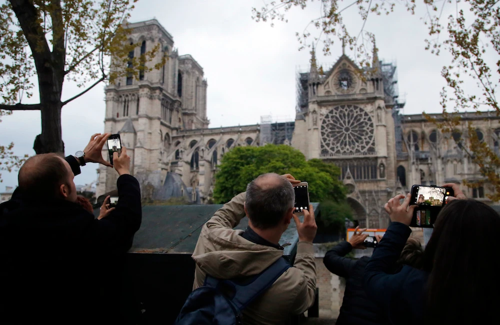 Paris’ regional health agency is recommending that children under seven and pregnant women who live near Notre Dame Cathedral take a blood test over concerns that the fire may have caused lead pollution in the area. (File/AP)