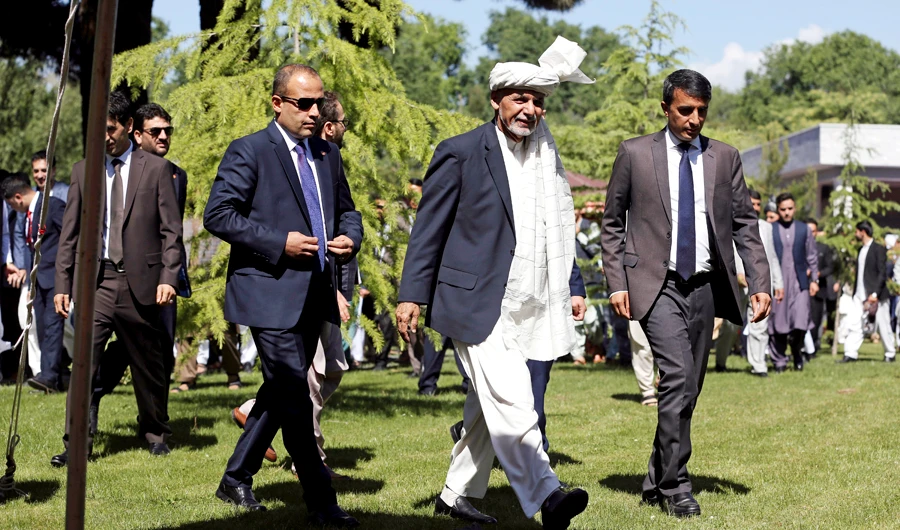 Afghanistan's President Ashraf Ghani arrives for a speech after offering Eid Al-Fitr prayers during the Eid Al-Fitr at the presidential palace in Kabul, Afghanistan, Tuesday, June 4, 2019. (AP)
