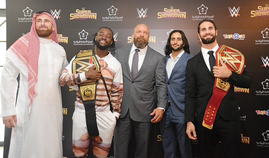 From left, Mojo Rawley, Kofi Kingston, Triple H, Mansour Al-Shehail and Seth Rollins during the press conference on Thursday. (AN photo by Huda Bashatah)