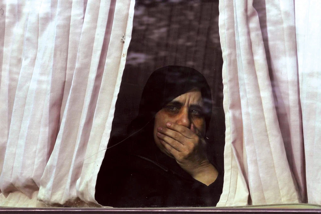 A woman prisoner released by the Syrian government returns to her home in western Aleppo in 2017. The regime last year confirmed the deaths of at least 161 people who had been missing since 2011. (Reuters)