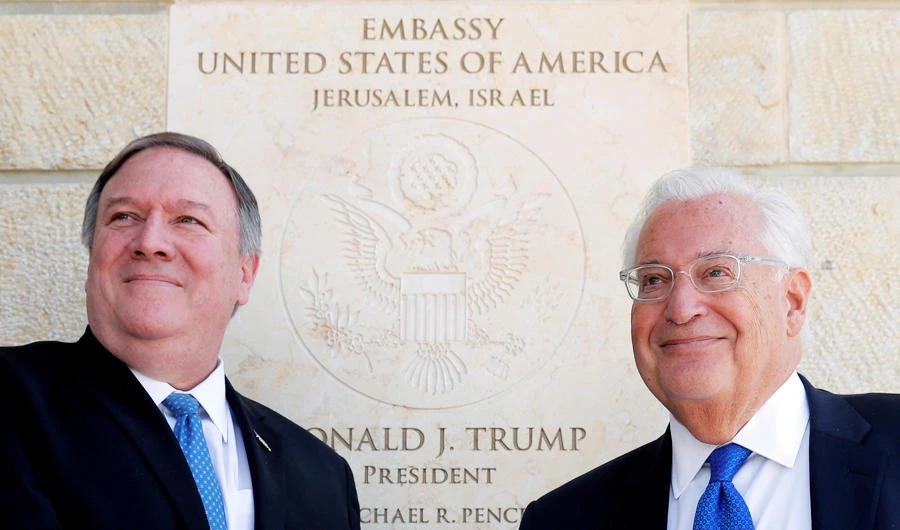 US Secretary of State Mike Pompeo and U.S. Ambassador to Israel David Friedman stand next to the dedication plaque at the U.S. embassy in Jerusalem March 21, 2019. (REUTERS)