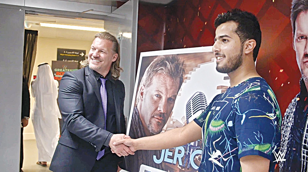 Abdulmalik Ali Al-Muwizri with Chris Jericho. (Supplied)