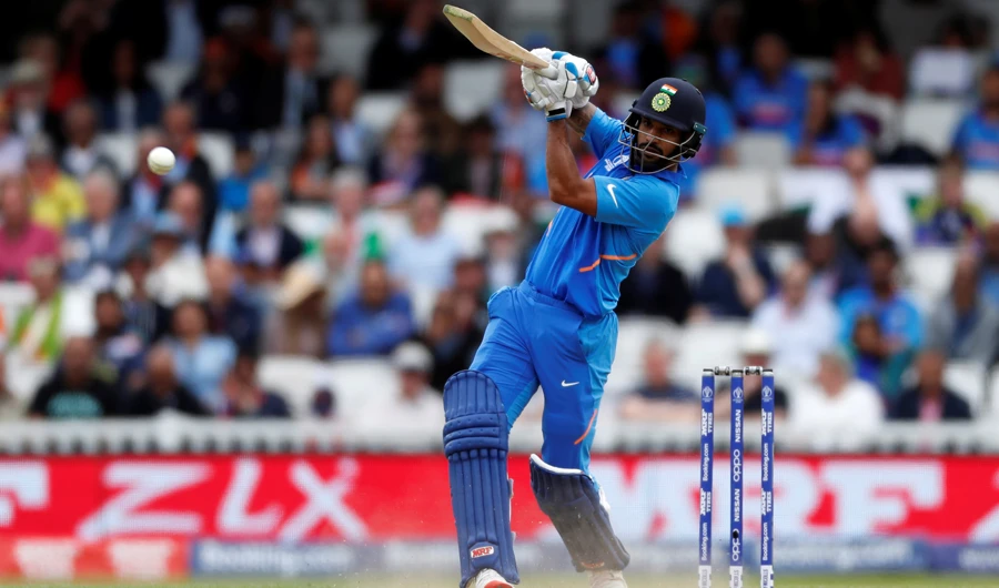 Dhawan ton helps India down Australia