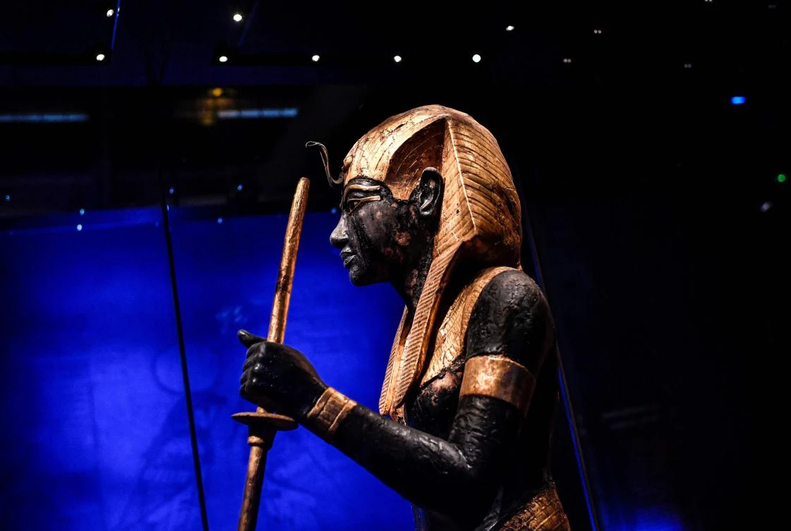 A sculpture depicting Tutankhamun is displayed during the exhibition ‘Tutankhamun,Treasures of the Golden Pharaoh’ at La Villette in Paris. (AP)