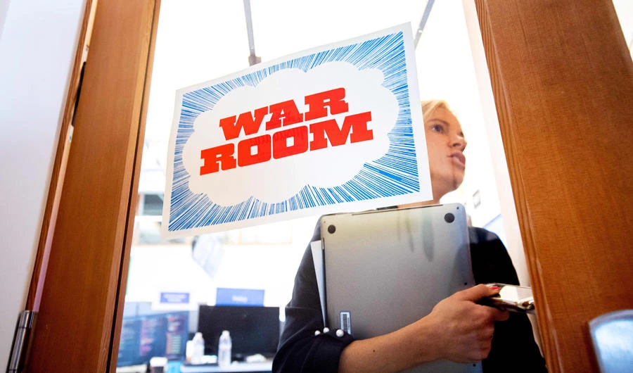 In this file photo taken on October 17, 2018 Facebook worker Erin Landers leaves the company's "War Room," during a media demonstration in Menlo Park, California. (AFP)