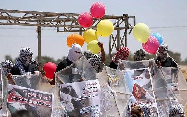 Israel closes Gaza fishing zone due to fire balloons