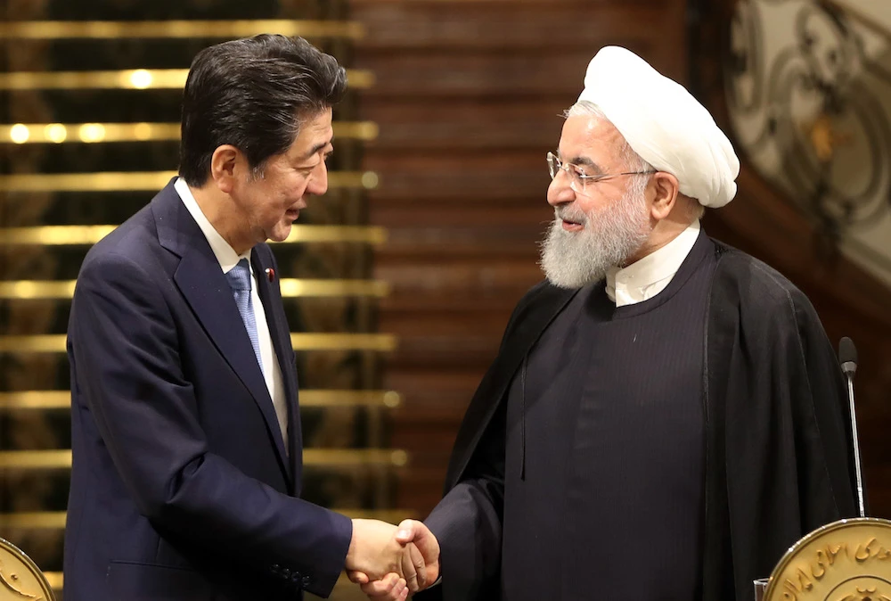 Iranian President Hassan Rouhani and Japanese Prime Minister Shinzo Abe at the Saadabad Palace in Tehran on Wednesday. (AFP)