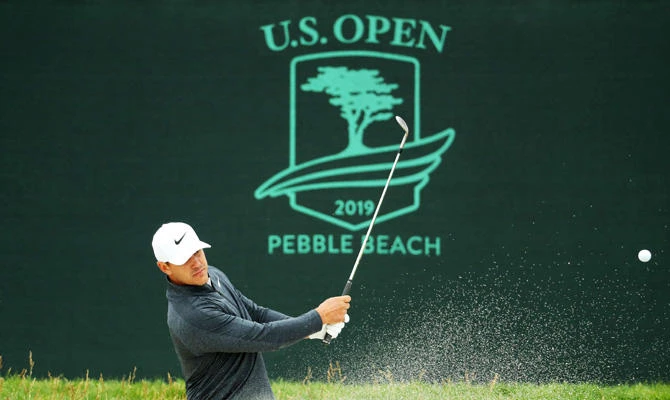 Brooks Koepka plays a shot from a bunker on the fifth hole during a practice round prior to the 2019 UUS Open at Pebble Beach Golf Links on June 12, 2019 in Pebble Beach, California. (Getty Images/AFP)