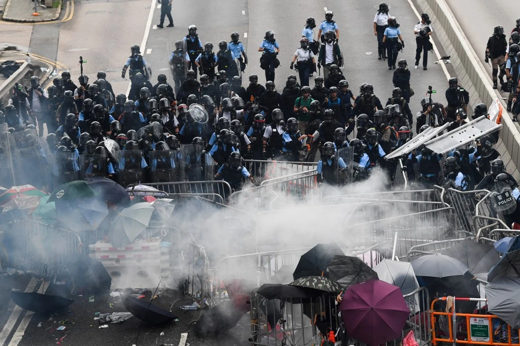 Hong Kong police clash with protesters during a rally against a controversial extradition bill on Wednesday, June 12, 2019. Scuffles broke out between demonstrators and police broke out anew on Thursday. (AFP)