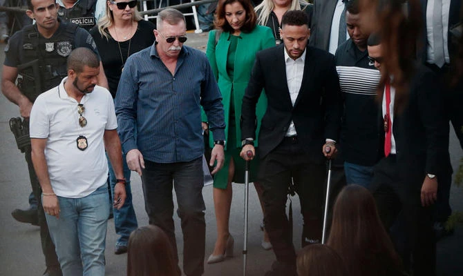 Football superstar Neymar undergoes questioning by Brazil police, denies rape claim