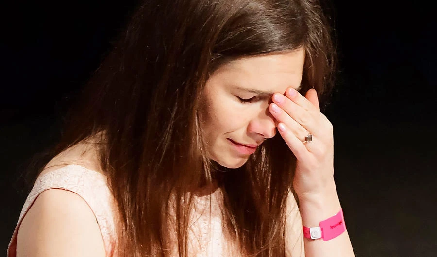 US journalist Amanda Knox reacts after she addressed a panel discussion titled "Trial by Media" during the Criminal Justice Festival at the Law University of Modena, northern Italy on June 15, 2019. (AFP)