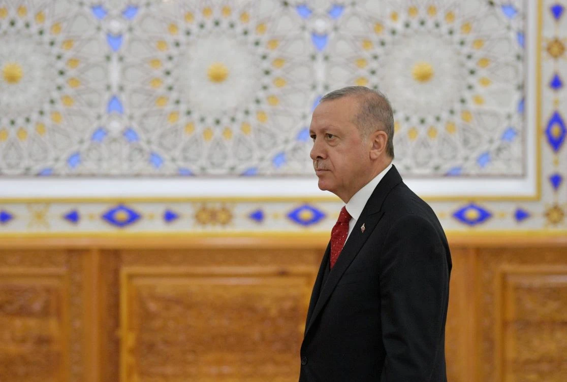 Turkish President Recep Tayyip Erdogan walks to attend the Conference on Interaction and Confidence-Building Measures in Asia (CICA) in Dushanbe on June 15, 2019. (AFP)
