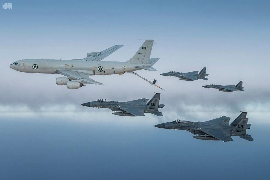 Royal Saudi Air Force aircraft and F-15C fighters belonging to the US Air Force flew in formation over the Arabian Gulf Sunday. (SPA)