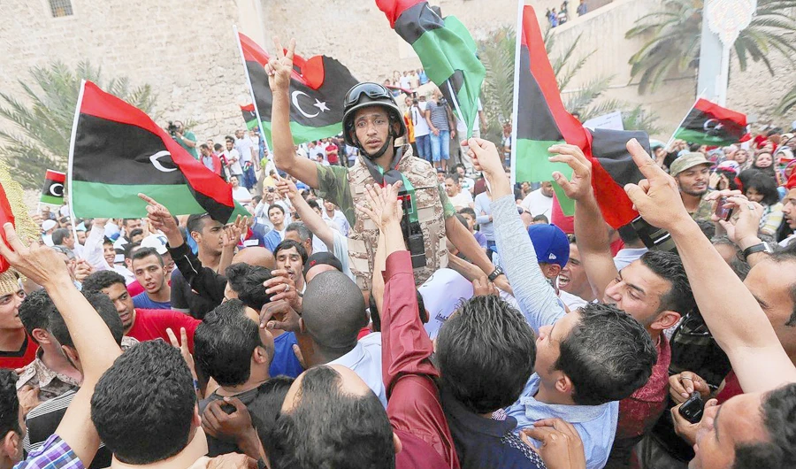 Libyans rally in Tripoli in support of Gen. Khalifa Haftar, who began an armed campaign to ‘bring stability’ to the nation. (AFP)