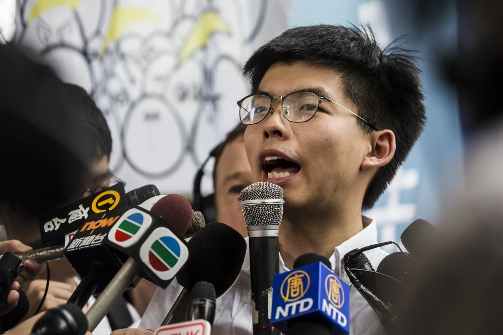 Hong Kong activist Joshua Wong leaves jail, vows to join protests