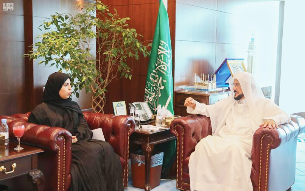 Saudi Islamic Affairs Minister Sheikh Abdullatif Al-Asheikh receives Dr. Tamader bint Youssef Al-Rammah, deputy minister of labor and social development, at his office in Riyadh. (SPA)