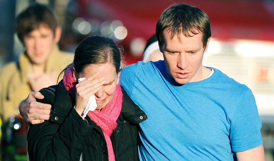 Father of boy killed in school massacre wins defamation suit