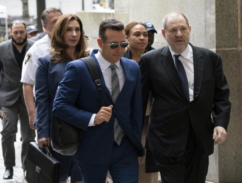 Jose Baez, left, sent a letter to a judge on Harvey Weinstein's, right, case to withdraw. (File/AFP)