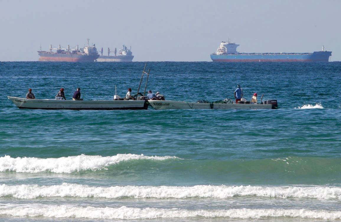 Fishing boats and oil tankers south of the Strait of Hormuz. (AP Photo)