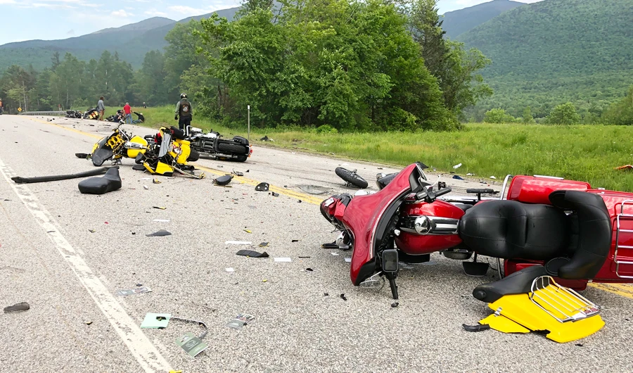 This photo provided by Miranda Thompson shows the scene where several motorcycles and a pickup truck collided on a rural, two-lane highway Friday, June 21, 2019 in Randolph, N.H. (AP)