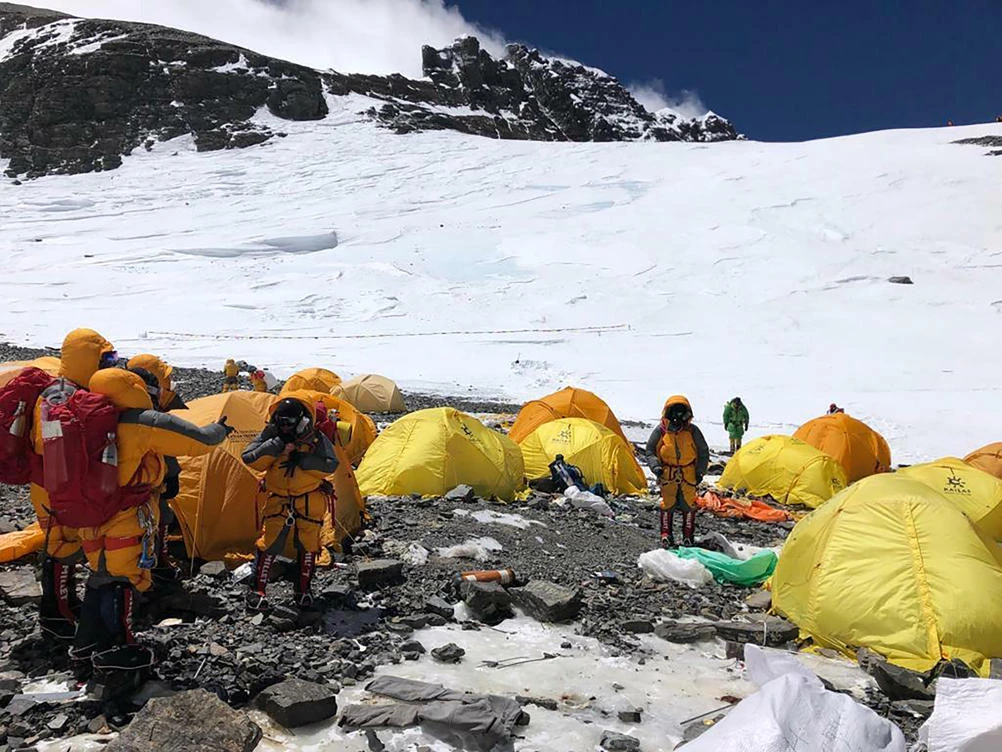 This May 21, 2019, photo provided by climber Dawa Steven Sherpa shows Camp Four, the highest camp on Mount Everest littered with abandoned tents. (Dawa Steven Sherpa/Asian Trekking via AP)
