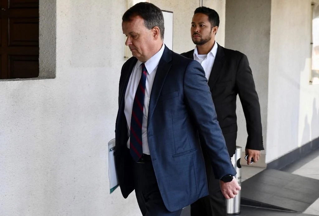 David Cope, the head of financial crime compliance for Goldman Sachs Asia, arrives at the Kuala Lumpur Magistrate’s Court for a pre-trial hearing for three Goldman Saches units over 1MDB scandal on Monday, June 24, 2019. (AFP)