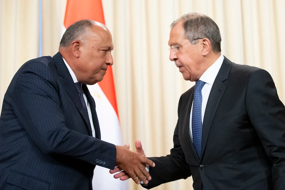 Russian Foreign Minister Sergey Lavrov, right, and Egyptian Foreign Minister Sameh Shoukry shake hands after their joint news conference following their talks in Moscow, Russia, Monday, June 24, 2019. (AP)