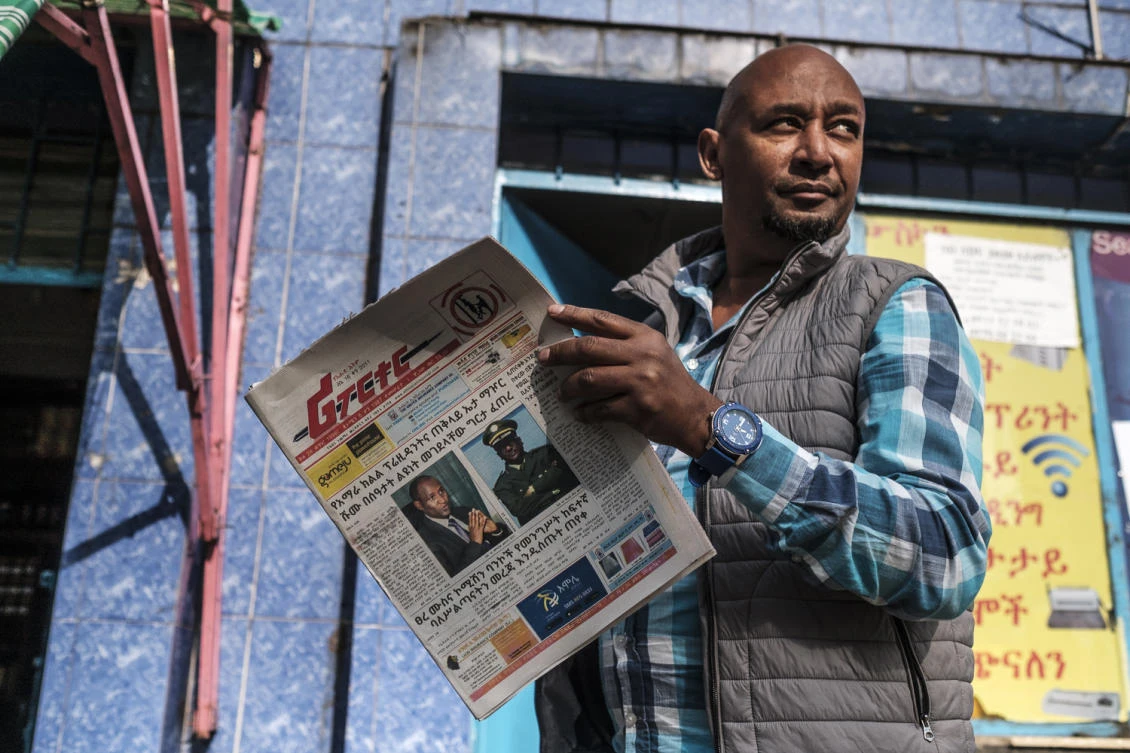 The front page of ‘The Reporter’ depicts the portraits of the assasinated Ambachew Mekonen, left, President of the Ahmara Region, and of Gen. Sere Mekonen, Chief of Staff of the Ethiopian National Forces. (AFP)