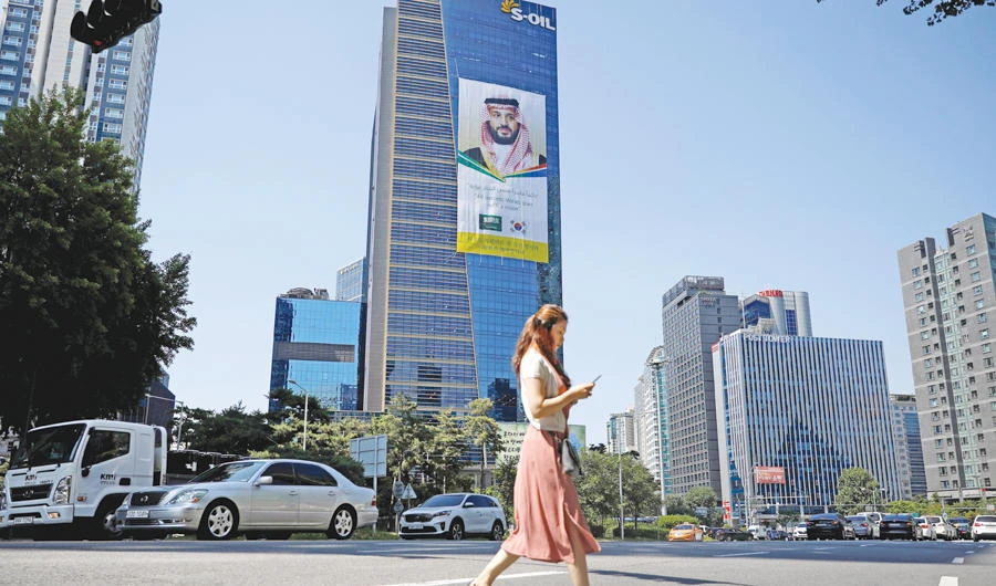 A giant banner welcoming Saudi Crown Prince Mohammed bin Salman to South Korea hangs on S-Oil headquarters building in Seoul on Monday. (Reuters)