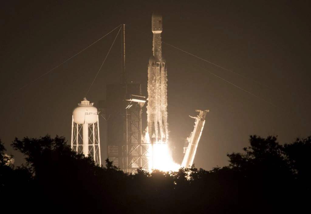 SpaceX launches hefty rocket with 24 satellites