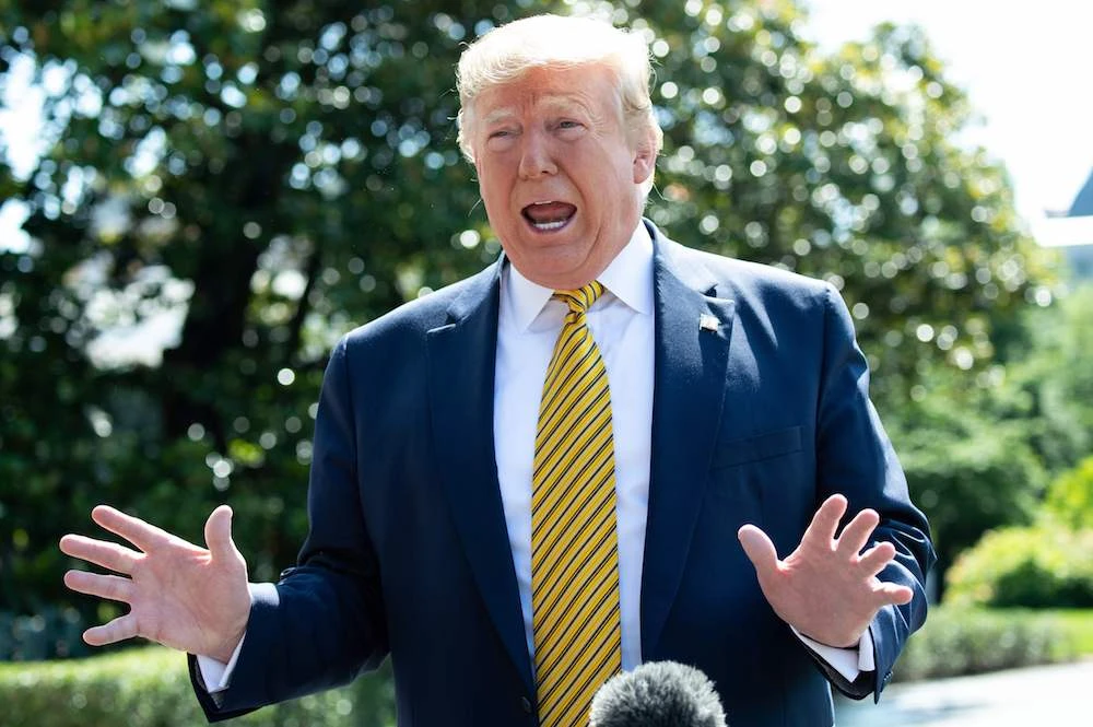 US president says any attack by Iran on anything American will be met with great and overwhelming force. (AFP)