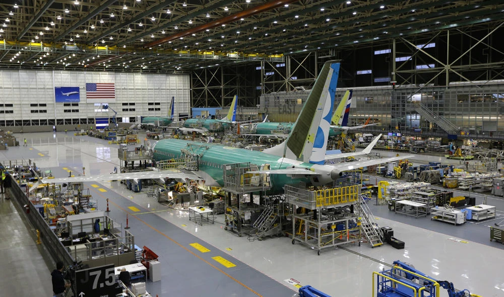 This Dec. 7, 2015, file photo shows the second Boeing 737 MAX airplane being built on the assembly line in Renton, Washington. (AP Photo/Ted S. Warren, File)