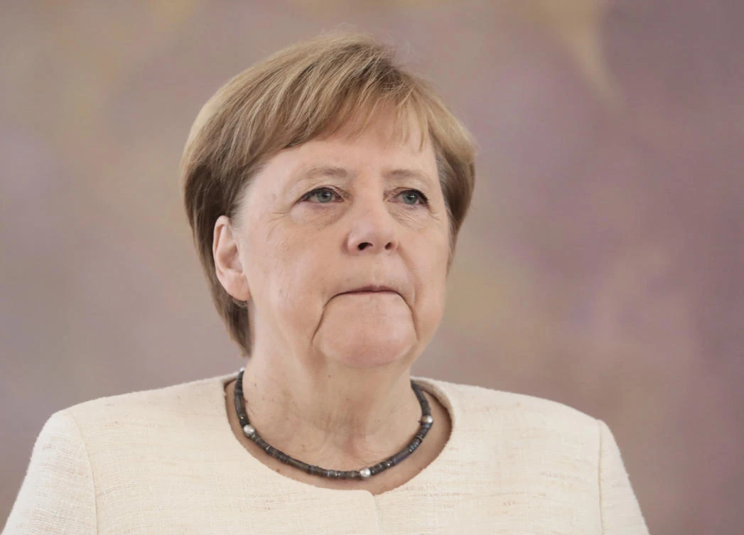 Chancellor Angela Merkel (CDU) takes part in the presentation of the appointment and dismissal certificate as Federal Minister of Justice to Katarina Barley (SPD) and the new Federal Minister of Justice Christine Lambrecht (SPD) by Federal President Frank-Walter Steinmeier in Bellevue Castle in Berlin, Germany, Thursday, June 27, 2019. (AP/Kay Nietfeld/DPA)