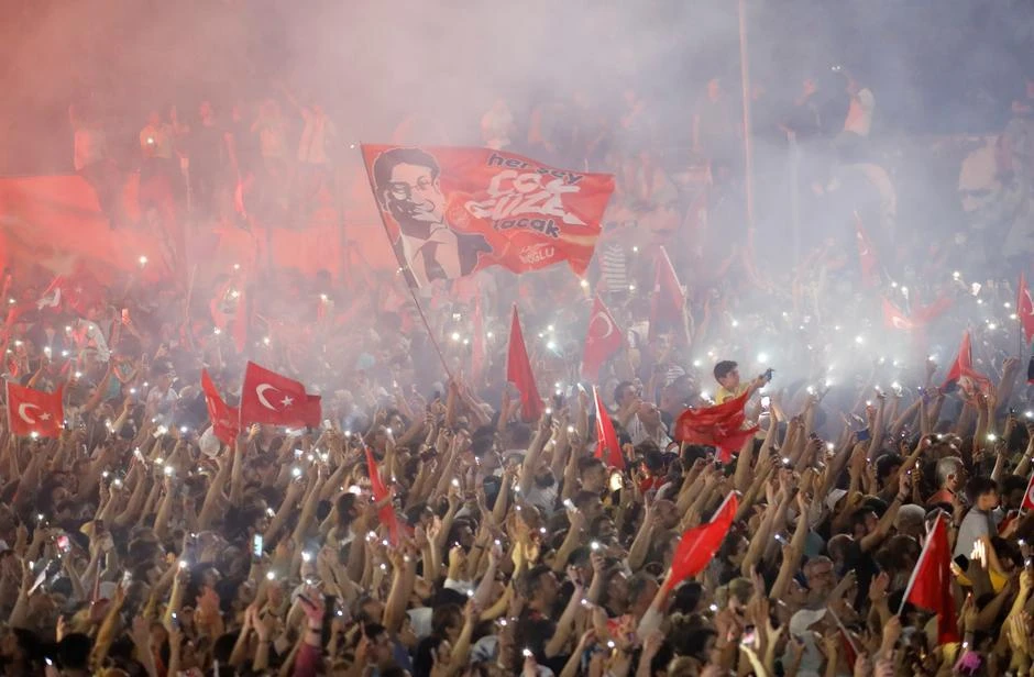 Supporters attend an Ekrem Imamoglu rally in the Beylikduzu district of Istanbul. Many experts view the Istanbul mayoral victory of the CHP’s Imamoglu as a stinging blow to Erdogan and his leadership. (Reuters)