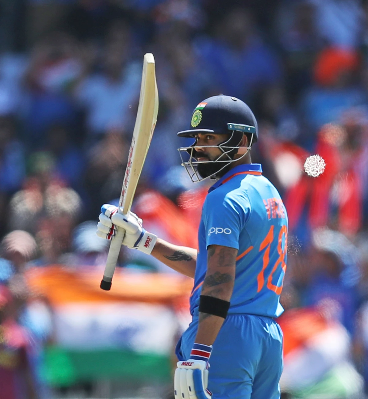 India’s captain Virat Kohli celebrates after scoring fifty runs during the Cricket World Cup match between India and West Indies at Old Trafford in Manchester. (AP Photo)
