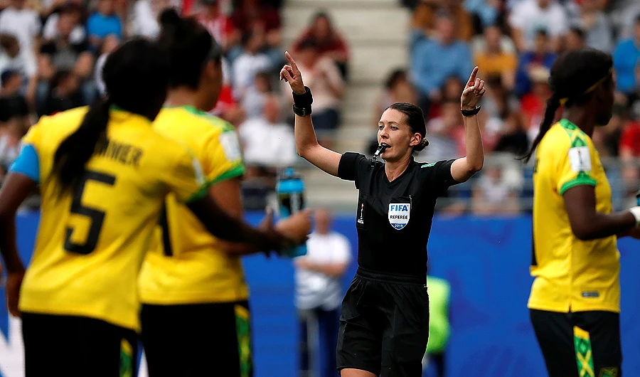 Referee Anna-Marie Keighley awards Italy a penalty after referring to VAR. (Reuters)