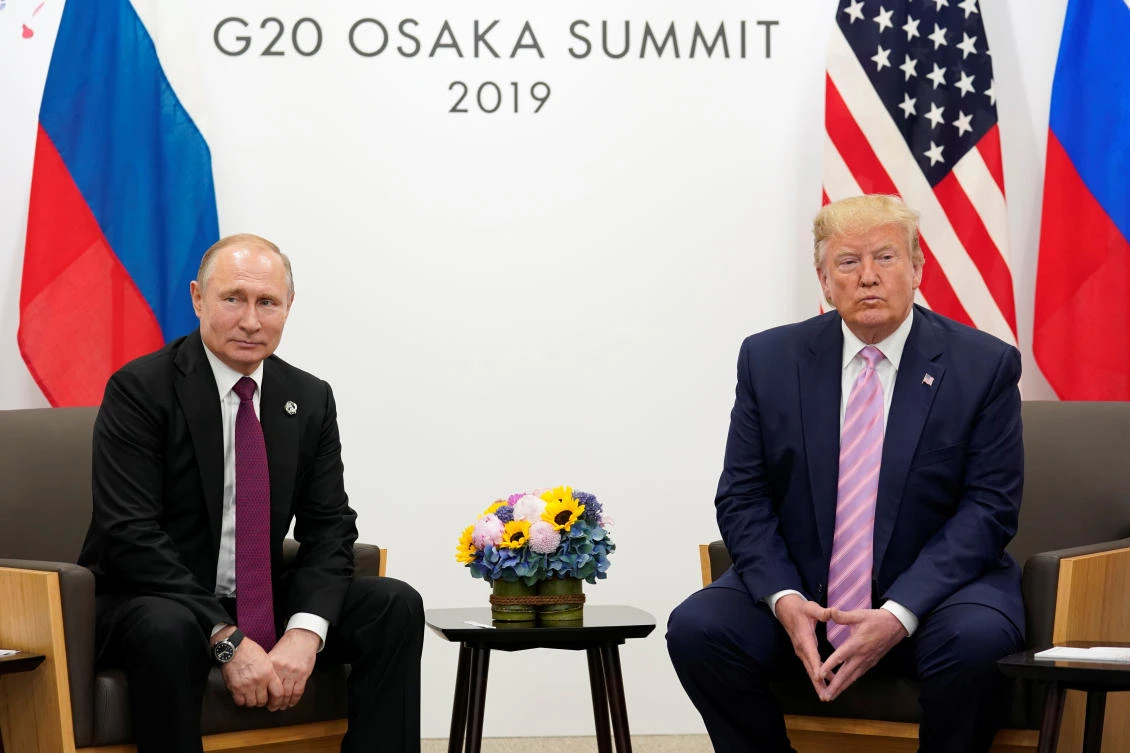 US President Donald Trump told reporters the content of the discussions with Russia’s President Vladimir Putin was ‘none of your business.’ (Reuters)