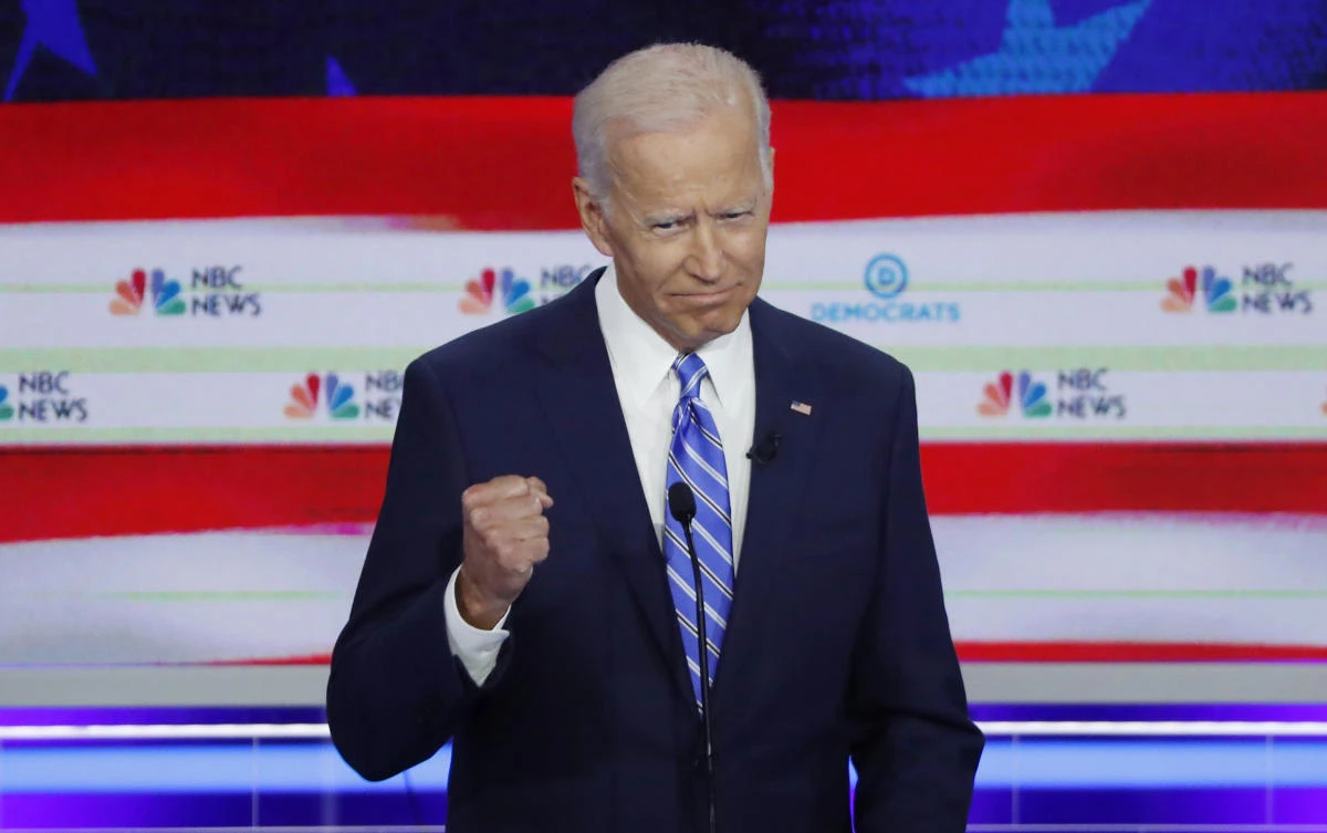 Biden under attack as 2020 Democrat rivals urge passing of torch
