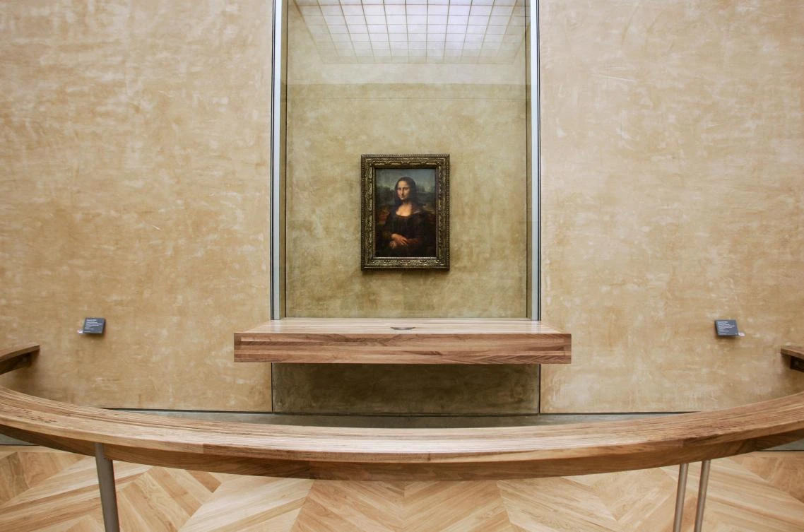 The famous painting by Italian artist Leonardo da Vinci, the Joconde “Mona Lisa,” is on display in the Salle des Etats room at the Louvre museum in Paris. (File/AFP)
