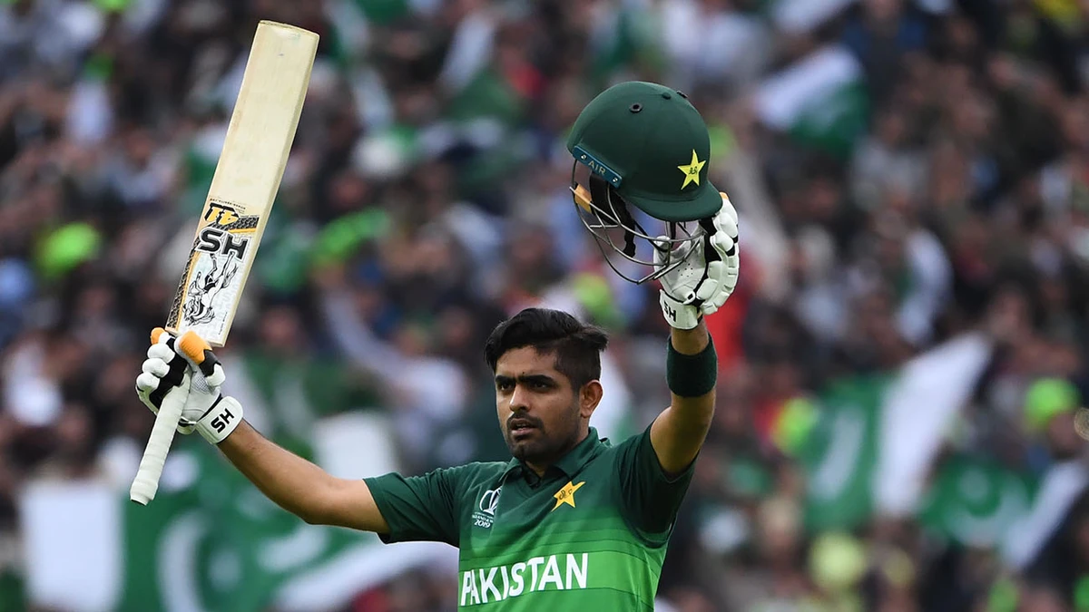 Pakistan's Babar Azam celebrates after scoring a century (100 runs) during the 2019 Cricket World Cup group stage match between New Zealand and Pakistan at Edgbaston in Birmingham, on June 26, 2019. (AFP)