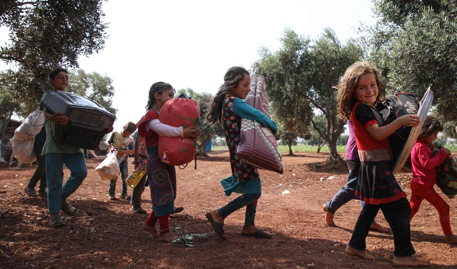 Many Syrians rely on aid to survive amid poverty and lack of food and medicine in parts of the country that had a pre-war population of 23 million. (AFP)