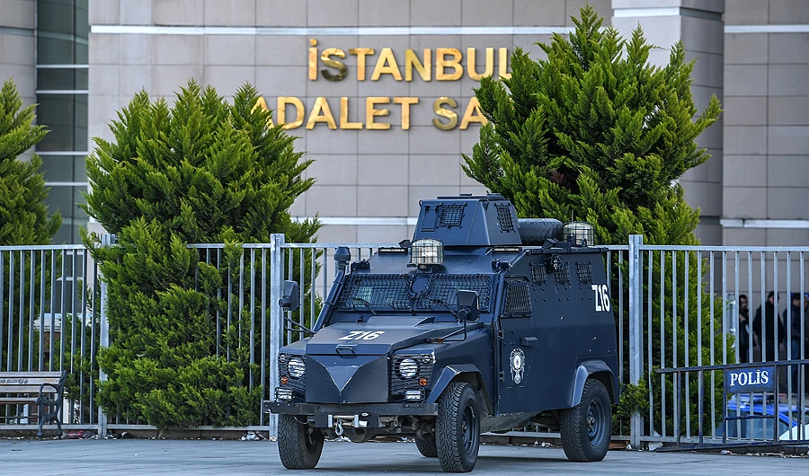 An armored Turkish police vehicle stands outside the courthouse in Istanbul during the trial of Metin Topuz. (File/AFP)