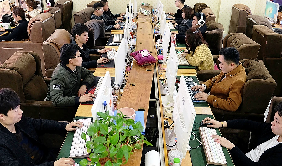 Employees work on labeling different items for data collection. (Reuters)