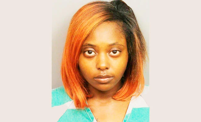 Alabama woman charged in fetal death, her shooter goes free