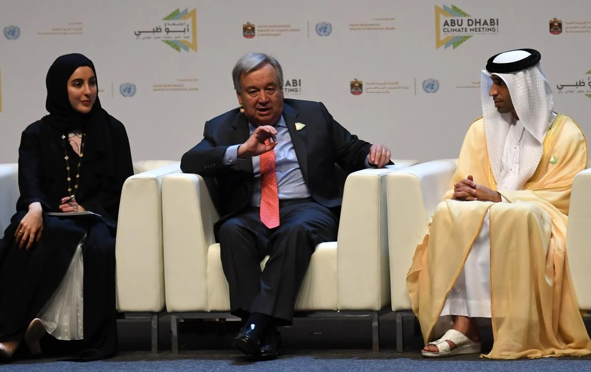 UN Secretary General Antonio Guterres, UAE Minister of State for Youth Affairs Shamma Al-Mazrui and UAE minister of climate change Thani Al-Zeyoudi chair a panel during the opening of the Abu Dhabi climate meeting Summit on June 30, 2019 in Abu Dhabi. (AFP)