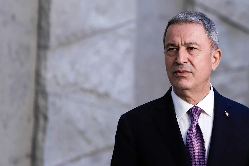 Turkish Defence Minister Hulusi Akar looks on before posing for a family picture during the NATO Defence Ministers meeting in Brussels on June 27, 2019. (File/AFP)