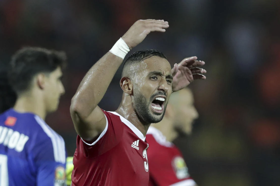 Morocco's Mehdi Amine El Mouttaqui celebrates end of the African Cup of Nations group D soccer match between Morocco and Ivory Coast in Al Salam Stadium in Cairo. (AP)